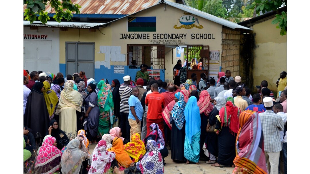 FILE - People line up to cast their vote in Zanzibar, Tanzania, Oct.28, 2020.