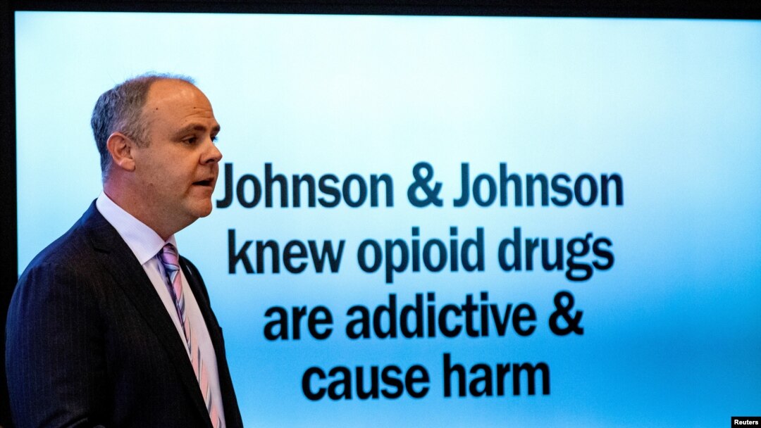 FILE - State's attorney Brad Beckworth presents information in the opening statements during the Oklahoma v. Johnson & Johnson opioid trial at the Cleveland County Courthouse in Norman, Oklahoma, May 28, 2019. 