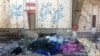 Militants’ Bodies Still Rot in Old Mosul Amid Rebuilding Efforts