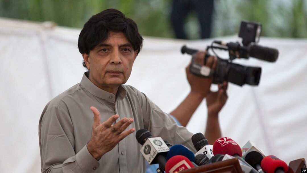 FILE - Pakistani Interior Minister Nisar Ali Khan speaks to reporters in Islamabad, Sept. 23, 2016. Following the abduction and killing of two Chinese nationals, Khan directed authorities to review the process of issuance of visas to Chinese nationals.