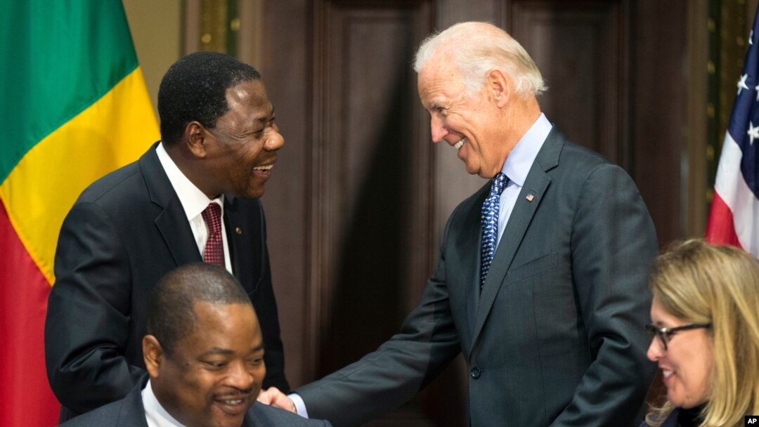 Vice President Joe Biden, right, shakes hands with Benin's president Thomas Boni Yayi, during a Compact Signing Ceremony on Sept. 9, 2015, in Washington. The compact is for a $375 million Millennium Challenge Corporation grant.