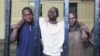 Omar Mwamnuadzi (C), leader of the separatist Mombasa Republican Council (MRC) arrives at the law court cells with members of the group at Kenya's Coastal region October 15, 2012. 