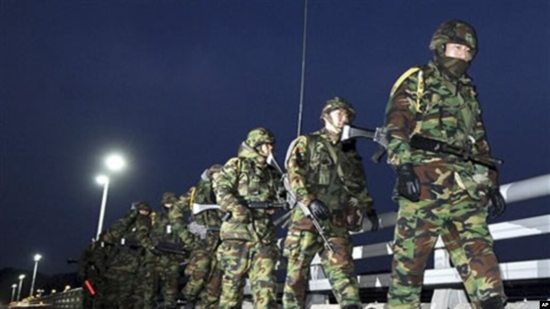 South Korean Marines patrol on the Yeonpyeong Island, South Korea, Monday, 06 Dec 2010
