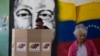 Electores venezolanos participan en el simulacro organizado por el CNE antes de la votación presidencial, este domingo 30 de junio de 2024, en Caracas.