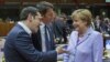 Greek Prime Minister Alexis Tsipras (L), Italian Prime Minister Matteo Renzi (C) and German Chancellor Angela Merkel attend a European Union leaders summit in Brussels, Belgium, June 25, 2015. 