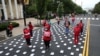 National Nurses United (NNU) holds a protest against working conditions and a gathering to honor the more than 400 registered nurses who have died from COVID-19, outside of the White House in Washington, May 12, 202…