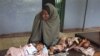 Malnourished children from southern Somalia on a bed at Bandar hospital in Mogadishu, Somalia, August 1, 2011