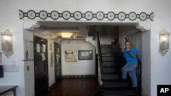 FILE: Brandi Marshall, Five Keys director of housing services, walks up the stairs while interviewed at a Five Keys transitional housing location in San Francisco, Aug. 26, 2024.