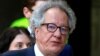 FILE - Australian actor Geoffrey Rush reacts as he arrives at the Federal Court in Sydney, Nov. 8, 2018.