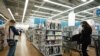 FILE - In this March 25, 2021 file photo, shoppers look at items in Bed, Bath and Beyond, in New York. U.S. consumer prices increased a sharp 0.6% in March, the biggest increase since 2012, while inflation over the past year rose a sizable 2.6%. The big…