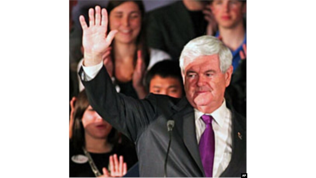 Republican U.S. presidential candidate and former Speaker of the House Newt Gingrich waves to supporters at the conclusion of his speech at his Alabama and Mississippi primary election night rally in Hoover, Alabama, March 13, 2012