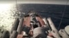 The Russian missile cruiser Moskva sails near the Syrian coast in this photo made from video posted to the Russian Defense Ministry official web site on Friday, Nov. 27.