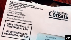 FILE - This March 23, 2018, photo shows an envelope containing a 2018 census letter mailed to a U.S. resident as part of the nation's only test run of the 2020 Census. 