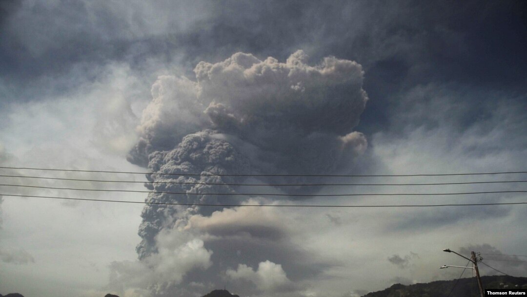Ash and smoke billow as the La Soufriere volcano erupts in Kingstown on the eastern Caribbean island of St. Vincent, April 9, 2021.