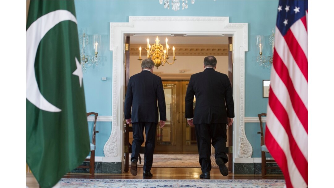 Secretary of State Mike Pompeo, right, meets Pakistani Foreign Minister Makhdoom Shah Mahmood Qureshi at the State Department in Washington, Tuesday, Oct. 2, 2018.