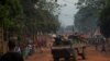 FILE - French soldiers drive through the Miskine neighborhood of Bangui, Central African Republic, Dec. 26, 2013.