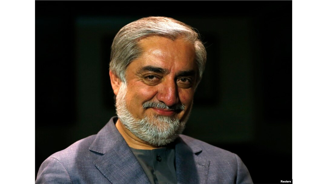 Afghan presidential candidate Abdullah Abdullah smiles during an interview in Kabul, Apr. 19, 2014.