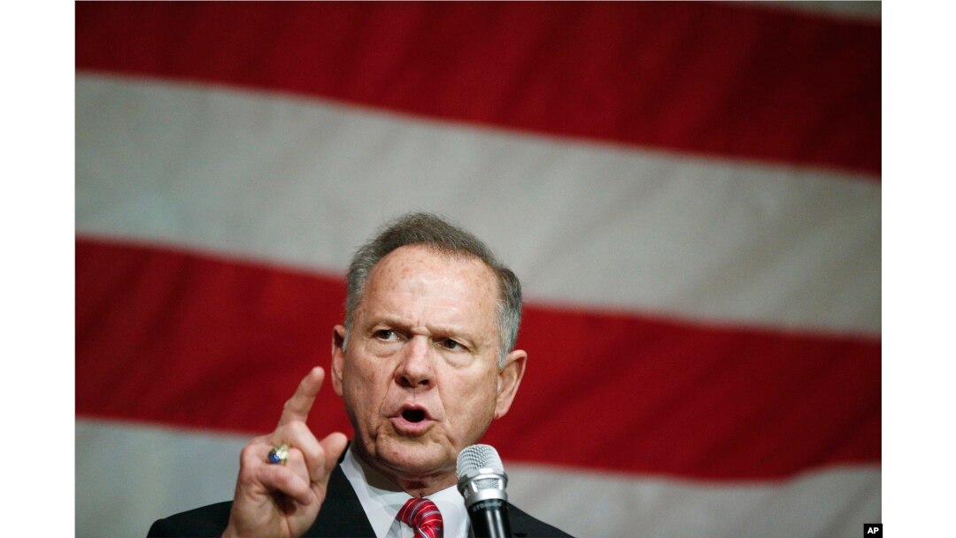 FILE - Former Alabama Chief Justice and U.S. Senate candidate Roy Moore speaks at a campaign rally, Dec. 5, 2017, in Fairhope, Ala.