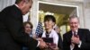 Burma's Aung San Suu Kyi (C) is presented with Congressional Gold Medal by Speaker of US House John Boehner as House Minority Leader Nancy Pelosi (2nd L) and Senate Minority Leader Sen. Mitch McConnell (R) look on Sept. 19, 2012