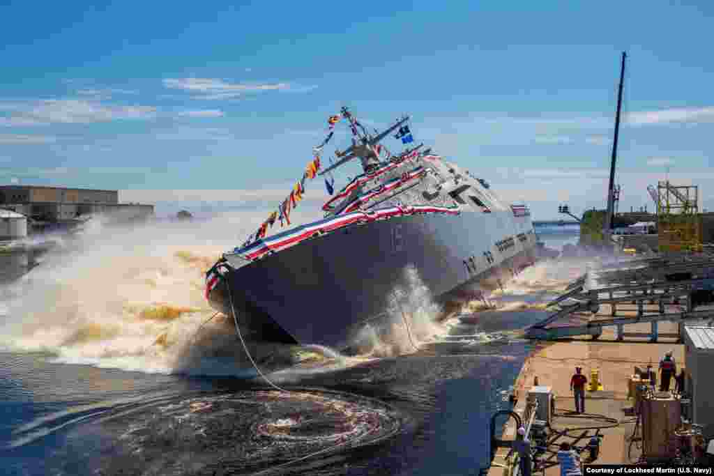 The U.S. Navy&rsquo;s future USS Billings (LCS 15) launches sideways into the Menominee River in Marinette, Wisconsin, July 1, 2017, following its christening by ship sponsor Sharla Tester. Once commissioned, LCS-15 will be the first ship of its name in naval service.