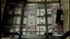 US Fed Ends Bond Buying Program, Keeps Interest Rates Low