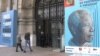 Visitors enter the Nelson Mandela exhibit in Paris