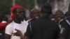 Supporters of presidential candidate Nana Akufo-Addo of the opposition New Patriotic Party protest at the electoral commission in Accra, Ghana, December 9, 2012.