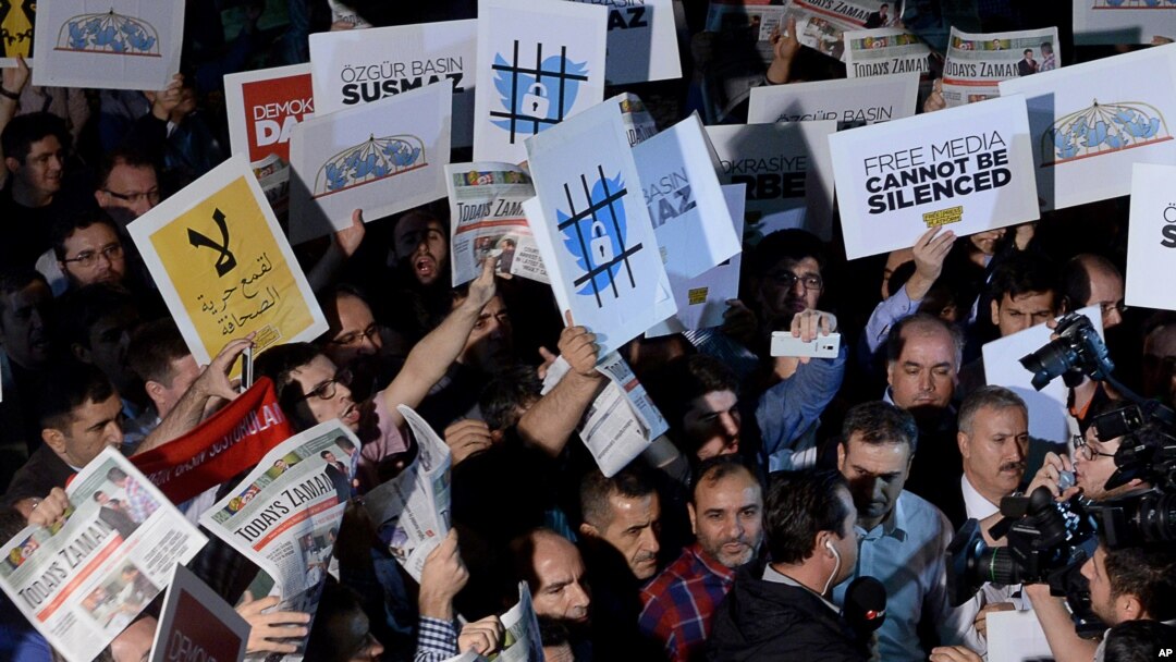 FILE - People rally in support of press freedom in Istanbul, Turkey, Oct. 9, 2015.