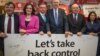 FILE - British politicians (L-R) John Whittingdale, Theresa Villiers, Michael Gove, Chris Grayling, Iain Duncan Smith and Priti Patel pose for a photograph at the launch of the Vote Leave campaign, at the group's headquarters in central London, Feb. 20, 2016. 