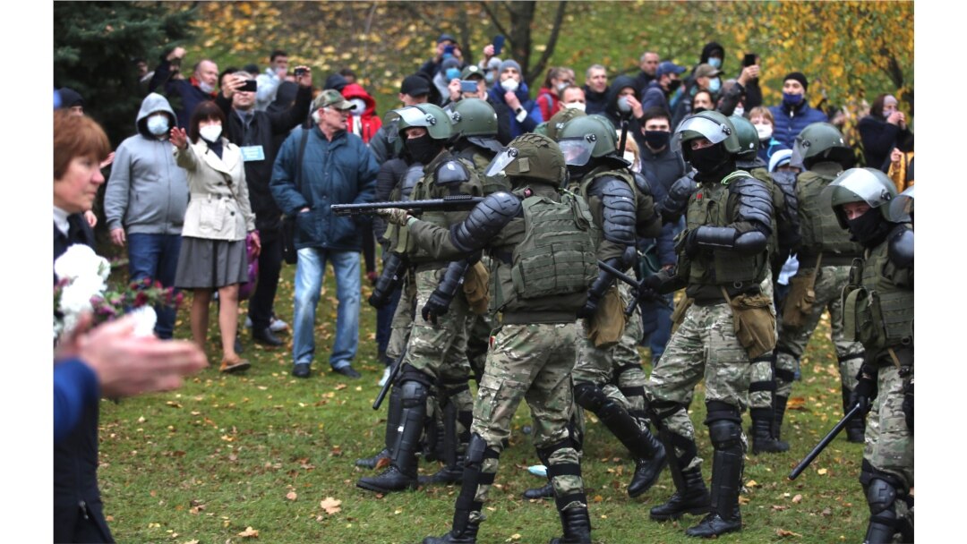 People argue with policemen during an opposition rally to protest the official presidential election results in Minsk, Belarus, Nov. 1, 2020.