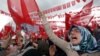 Supporters cheer Turkey's President Recep Tayyip Erdogan as he addresses an election rally ahead of Sunday's general election in Golbasi, Ankara, Turkey, June 5, 2015. 