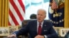 FILE - President Joe Biden speaks before signing executive orders at the White House in Washington, Jan. 28, 2021.