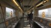 Workers sanitize Delhi metro coaches after it completes a round in Gurugram on the outskirts of New Delhi, India, Sept. 7, 2020.