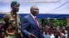 Central African Republic's new President Michel Djotodia speaks to his supporters at a rally in favor of the Seleka rebel coalition in downtown Bangui Mar. 30, 2013.