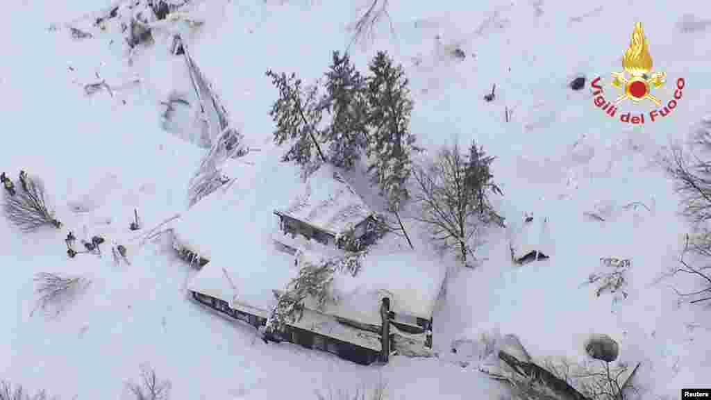 An aerial view shows Hotel Rigopiano in Farindola, central Italy, hit by an avalanche, in this handout picture provided by Italy's firefighters.