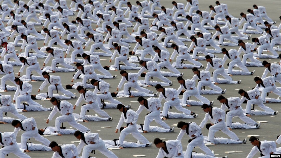 FILE - Members of the Special Warfare Command demonstrate the traditional Korean martial art of taekwondo during celebrations to mark the 65th anniversary of Korea Armed Forces Day, Seongnam, Oct. 1, 2013. 