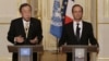 United Nations Secretary General Ban Ki-moon, left, and France's President Francois Hollande, speak to the media during a joint press conference at the Elysee Palace in Paris, October 9, 2012. 