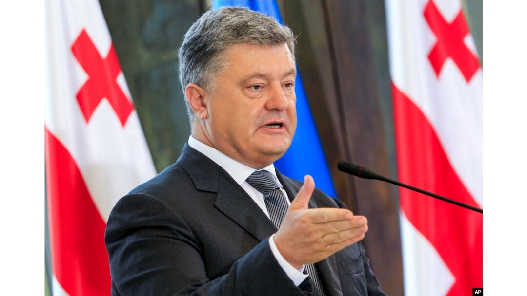 FILE - Ukrainian President Petro Poroshenko speaks at a press conference in Tbilisi, Georgia, July 18, 2017.