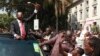 Kenya's Deputy Prime Minister Uhuru Kenyatta leaves in company of supporters after he was cleared by the Independent Electoral and Boundaries Commission (IEBC) to run for the presidency in the March 4 presidential elections in capital Nairobi, January 30, 2013.