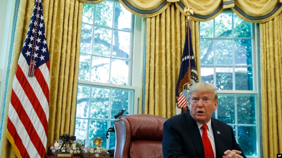 FILE - President Donald Trump speaks at the White House, in Washington, Feb.10, 2020.