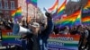 Participants march and shout slogans during a protest by gay rights activists in St. Petersburg May 1, 2013.