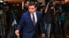 FILE - Selahattin Demirtas, co-leader of the pro-Kurdish Peace and Democracy Party, arrives for a meeting with representatives of minorities living in Turkey at a hotel in central Istanbul ahead of elections, Oct. 28, 2015.