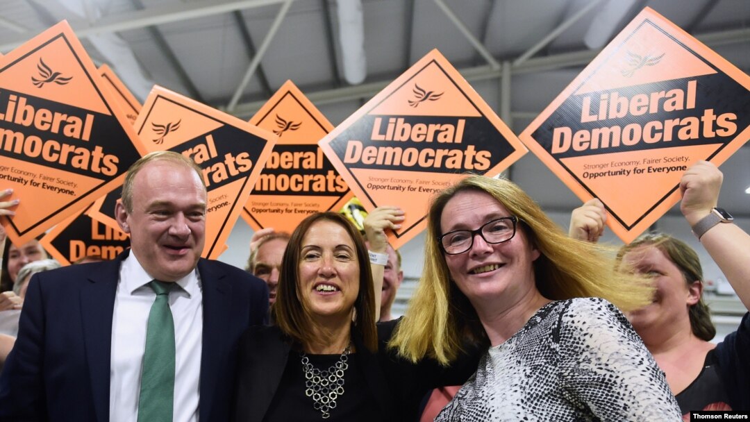 Liberal Democrats candidate Jane Dodds, center, reacts after winning the by-election for the district of Brecon and Radnorshire at the Royal Welsh Showground, near Builth Wells in Wales, Britain Aug. 2, 2019. 