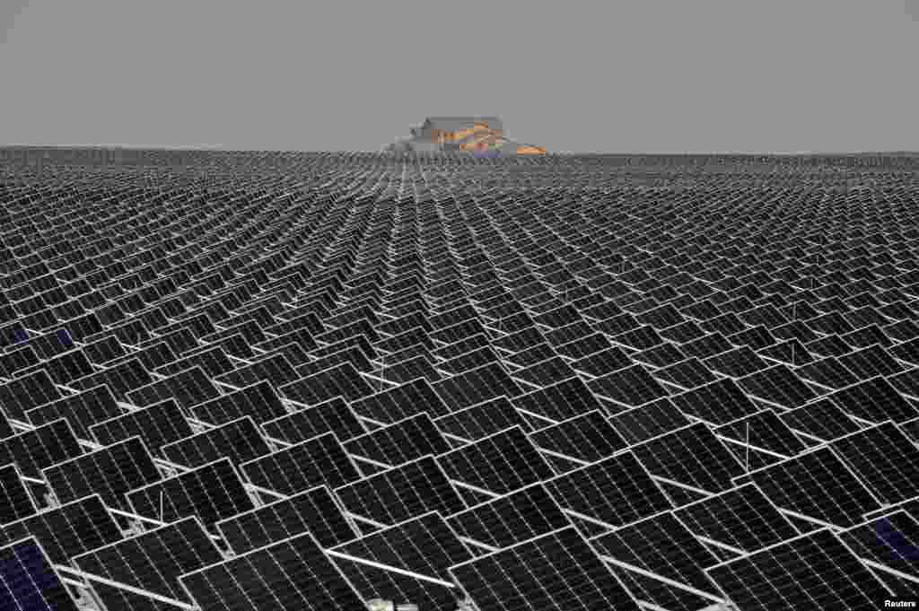 Solar panels are seen in Yinchuan, Ningxia Hui Autonomous Region, China, April 18, 2017.