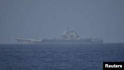Chinese aircraft carrier Shandong sails in Pacific Ocean waters, south of Okinawa prefecture, Japan