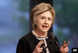 FILE - Former U.S. Secretary of State Hillary Clinton speaks in Baltimore, Maryland, June 5, 2017.