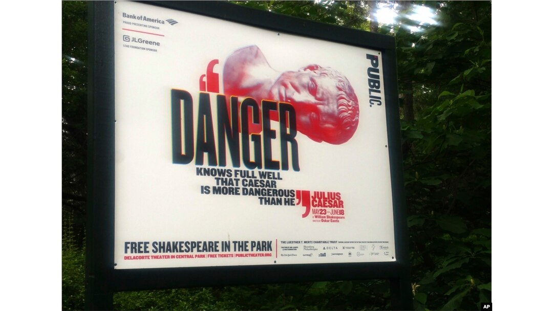 "Danger knows full well that Caesar is more dangerous than he," reads a sign promoting Public Theater's production of "Julius Caesar."