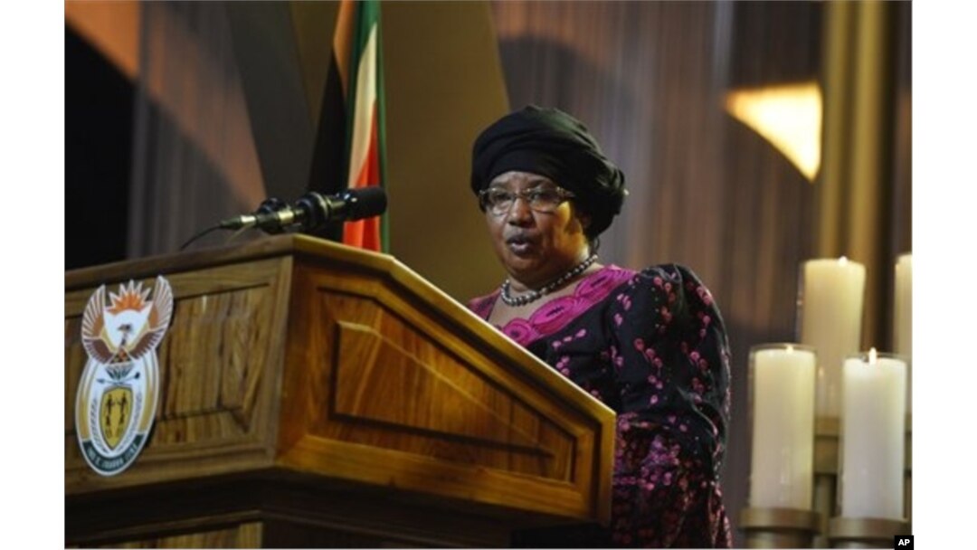 FILE - Malawi President Joyce Banda speaks during funeral service for Nelson Mandela, Qunu, South Africa, Dec. 15, 2013.