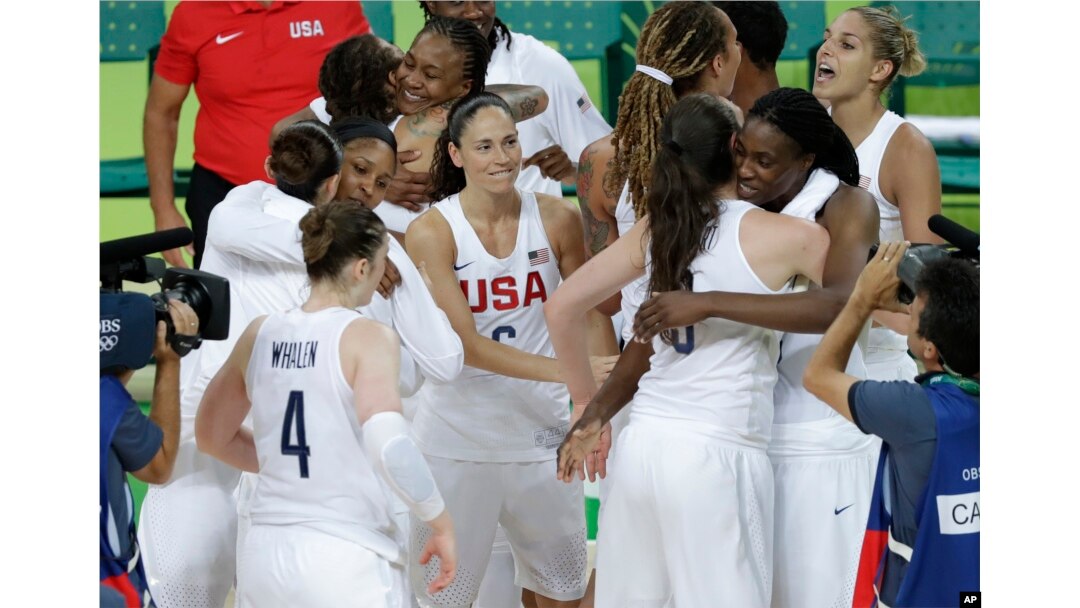 U.S. players celebrate after the gold medal basketball game against Spain at the 2016 Summer Olympics in Rio de Janeiro, Brazil, Aug. 20, 2016.