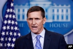 FILE - National Security Adviser Michael Flynn speaks during the daily news briefing at the White House, in Washington, Feb. 1, 2017.